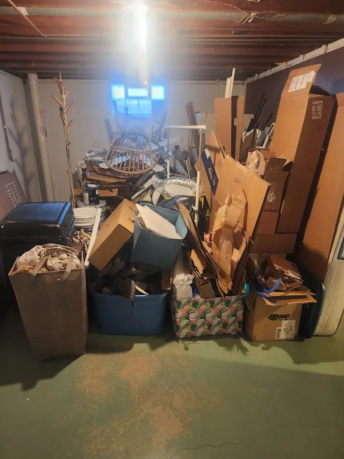 Roll-off dumpster container at job site for 2 Yard Dumpster Rental in Odessa